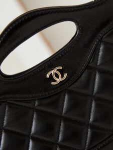 CHANEL 31 Nano Shopping Bag. Authentic quality luxury bag crafted in genuine leather comes with authenticity card, dust bag and gift bag. Small in size, grand in statement. A miniature marvel that captures the sophistication of CHANEL in its most playful form. Crafted with meticulous precision, this petite icon merges the timeless spirit of the CHANEL 31 with a modern twist on everyday elegance. Designed in supple lambskin and finished with gleaming gold-tone hardware, the Nano 31 doesn’t just carry your essentials — it carries your attitude. Whether worn crossbody, by hand, or dangling from the crook of your arm, this charming piece elevates every ensemble with a whisper of Parisian chic. Perfect for a night out or a day in the spotlight, it’s not just a bag — it’s your boldest accessory in its most compact form. Because luxury doesn't need to shout. Sometimes, it just needs to charm. - KRIS + KIKO CHANEL 31 Nano Shopping Bag. Authentic quality luxury bag crafted in genuine leather comes with authenticity card, dust bag and gift bag. Small in size, grand in statement. A miniature marvel that captures the sophistication of CHANEL in its most playful form. Crafted with meticulous precision, this petite icon merges the timeless spirit of the CHANEL 31 with a modern twist on everyday elegance. Designed in supple lambskin and finished with gleaming gold-tone hardware, the Nano 31 doesn’t just carry your essentials — it carries your attitude. Whether worn crossbody, by hand, or dangling from the crook of your arm, this charming piece elevates every ensemble with a whisper of Parisian chic. Perfect for a night out or a day in the spotlight, it’s not just a bag — it’s your boldest accessory in its most compact form. Because luxury doesn't need to shout. Sometimes, it just needs to charm.