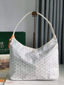GOYARD Bohème Hobo Bag. Authentic quality luxury bag crafted in genuine leather comes with authenticity card, dust bag and gift bag. Wander Freely. Carry Elegantly. Introducing the Goyard Bohème Hobo Bag—a tribute to Parisian spirit and wanderlust. Inspired by the timber raftsmen’s humble travel pouches, this bag blends heritage storytelling with everyday luxury. Crafted to be exceptionally lightweight and flexible, it drapes effortlessly on your shoulder with a wide, comfortable handle designed for long city strolls or spontaneous weekend escapes. Its beauty lies not only in its sleek silhouette but also in its thoughtful functionality. The secure zip closure keeps your essentials safe, while the removable snap-fastened pouch doubles as a chic clutch or wallet—perfect for a quick dash or stylish switch-up. Whether you’re wandering through cobblestone streets or navigating your daily routine, the Bohème ensures your essentials are always within reach. This is not just a bag—it’s your elegant partner in carefree adventures. - KRIS + KIKO GOYARD Bohème Hobo Bag. Authentic quality luxury bag crafted in genuine leather comes with authenticity card, dust bag and gift bag. Wander Freely. Carry Elegantly. Introducing the Goyard Bohème Hobo Bag—a tribute to Parisian spirit and wanderlust. Inspired by the timber raftsmen’s humble travel pouches, this bag blends heritage storytelling with everyday luxury. Crafted to be exceptionally lightweight and flexible, it drapes effortlessly on your shoulder with a wide, comfortable handle designed for long city strolls or spontaneous weekend escapes. Its beauty lies not only in its sleek silhouette but also in its thoughtful functionality. The secure zip closure keeps your essentials safe, while the removable snap-fastened pouch doubles as a chic clutch or wallet—perfect for a quick dash or stylish switch-up. Whether you’re wandering through cobblestone streets or navigating your daily routine, the Bohème ensures your essentials are always within reach. This is not just a bag—it’s your elegant partner in carefree adventures.