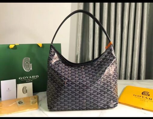 GOYARD Bohème Hobo Bag. Authentic quality luxury bag crafted in genuine leather comes with authenticity card, dust bag and gift bag. Wander Freely. Carry Elegantly. Introducing the Goyard Bohème Hobo Bag—a tribute to Parisian spirit and wanderlust. Inspired by the timber raftsmen’s humble travel pouches, this bag blends heritage storytelling with everyday luxury. Crafted to be exceptionally lightweight and flexible, it drapes effortlessly on your shoulder with a wide, comfortable handle designed for long city strolls or spontaneous weekend escapes. Its beauty lies not only in its sleek silhouette but also in its thoughtful functionality. The secure zip closure keeps your essentials safe, while the removable snap-fastened pouch doubles as a chic clutch or wallet—perfect for a quick dash or stylish switch-up. Whether you’re wandering through cobblestone streets or navigating your daily routine, the Bohème ensures your essentials are always within reach. This is not just a bag—it’s your elegant partner in carefree adventures.