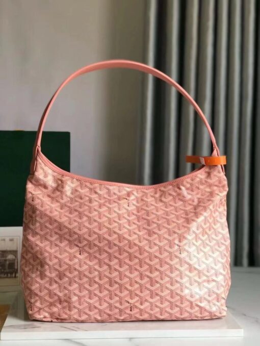 GOYARD Bohème Hobo Bag. Authentic quality luxury bag crafted in genuine leather comes with authenticity card, dust bag and gift bag. Wander Freely. Carry Elegantly. Introducing the Goyard Bohème Hobo Bag—a tribute to Parisian spirit and wanderlust. Inspired by the timber raftsmen’s humble travel pouches, this bag blends heritage storytelling with everyday luxury. Crafted to be exceptionally lightweight and flexible, it drapes effortlessly on your shoulder with a wide, comfortable handle designed for long city strolls or spontaneous weekend escapes. Its beauty lies not only in its sleek silhouette but also in its thoughtful functionality. The secure zip closure keeps your essentials safe, while the removable snap-fastened pouch doubles as a chic clutch or wallet—perfect for a quick dash or stylish switch-up. Whether you’re wandering through cobblestone streets or navigating your daily routine, the Bohème ensures your essentials are always within reach. This is not just a bag—it’s your elegant partner in carefree adventures.