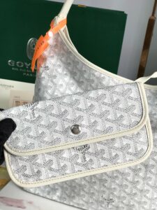 GOYARD Bohème Hobo Bag. Authentic quality luxury bag crafted in genuine leather comes with authenticity card, dust bag and gift bag. Wander Freely. Carry Elegantly. Introducing the Goyard Bohème Hobo Bag—a tribute to Parisian spirit and wanderlust. Inspired by the timber raftsmen’s humble travel pouches, this bag blends heritage storytelling with everyday luxury. Crafted to be exceptionally lightweight and flexible, it drapes effortlessly on your shoulder with a wide, comfortable handle designed for long city strolls or spontaneous weekend escapes. Its beauty lies not only in its sleek silhouette but also in its thoughtful functionality. The secure zip closure keeps your essentials safe, while the removable snap-fastened pouch doubles as a chic clutch or wallet—perfect for a quick dash or stylish switch-up. Whether you’re wandering through cobblestone streets or navigating your daily routine, the Bohème ensures your essentials are always within reach. This is not just a bag—it’s your elegant partner in carefree adventures. - KRIS + KIKO GOYARD Bohème Hobo Bag. Authentic quality luxury bag crafted in genuine leather comes with authenticity card, dust bag and gift bag. Wander Freely. Carry Elegantly. Introducing the Goyard Bohème Hobo Bag—a tribute to Parisian spirit and wanderlust. Inspired by the timber raftsmen’s humble travel pouches, this bag blends heritage storytelling with everyday luxury. Crafted to be exceptionally lightweight and flexible, it drapes effortlessly on your shoulder with a wide, comfortable handle designed for long city strolls or spontaneous weekend escapes. Its beauty lies not only in its sleek silhouette but also in its thoughtful functionality. The secure zip closure keeps your essentials safe, while the removable snap-fastened pouch doubles as a chic clutch or wallet—perfect for a quick dash or stylish switch-up. Whether you’re wandering through cobblestone streets or navigating your daily routine, the Bohème ensures your essentials are always within reach. This is not just a bag—it’s your elegant partner in carefree adventures.
