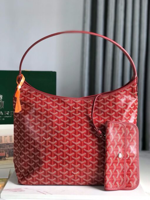 GOYARD Bohème Hobo Bag. Authentic quality luxury bag crafted in genuine leather comes with authenticity card, dust bag and gift bag. Wander Freely. Carry Elegantly. Introducing the Goyard Bohème Hobo Bag—a tribute to Parisian spirit and wanderlust. Inspired by the timber raftsmen’s humble travel pouches, this bag blends heritage storytelling with everyday luxury. Crafted to be exceptionally lightweight and flexible, it drapes effortlessly on your shoulder with a wide, comfortable handle designed for long city strolls or spontaneous weekend escapes. Its beauty lies not only in its sleek silhouette but also in its thoughtful functionality. The secure zip closure keeps your essentials safe, while the removable snap-fastened pouch doubles as a chic clutch or wallet—perfect for a quick dash or stylish switch-up. Whether you’re wandering through cobblestone streets or navigating your daily routine, the Bohème ensures your essentials are always within reach. This is not just a bag—it’s your elegant partner in carefree adventures.