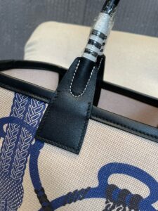 HERMÈS Steeple 25 Bag. Authentic quality luxury bag crafted in genuine leather comes with authenticity card, dust bag and gift bag. Where art meets heritage. The Hermès Steeple Bag is a charming fusion of heritage and artistry, crafted from a blend of canvas and Swift leather. Its design pays tribute to Hermès’ equestrian roots with whip-shaped handles and a stirrup-inspired charm, adding a playful yet sophisticated touch. Lightweight yet spacious, the Steeple is ideal for daily use. Whether you opt for a vibrant motif or a sleek, single-color design, this bag stands out as an artistic expression of luxury that seamlessly integrates into a modern lifestyle. Praised for its unique aesthetic and accessibility within the Hermès lineup, the Steeple Bag is adored by fashion enthusiasts who appreciate its colorful palette and bold personality. While it’s best suited for those who enjoy the texture and look of canvas, it remains a versatile statement piece that captures the spirit of everyday elegance. - KRIS + KIKO HERMÈS Steeple 25 Bag. Authentic quality luxury bag crafted in genuine leather comes with authenticity card, dust bag and gift bag. Where art meets heritage. The Hermès Steeple Bag is a charming fusion of heritage and artistry, crafted from a blend of canvas and Swift leather. Its design pays tribute to Hermès’ equestrian roots with whip-shaped handles and a stirrup-inspired charm, adding a playful yet sophisticated touch. Lightweight yet spacious, the Steeple is ideal for daily use. Whether you opt for a vibrant motif or a sleek, single-color design, this bag stands out as an artistic expression of luxury that seamlessly integrates into a modern lifestyle. Praised for its unique aesthetic and accessibility within the Hermès lineup, the Steeple Bag is adored by fashion enthusiasts who appreciate its colorful palette and bold personality. While it’s best suited for those who enjoy the texture and look of canvas, it remains a versatile statement piece that captures the spirit of everyday elegance.