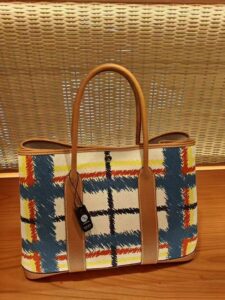 HERMÈS Garden Party Voyage. Authentic quality luxury bag crafted in genuine leather comes with authenticity card, dust bag and gift bag. The Art of Everyday Escape. Chic, structured, and effortlessly refined, the HERMÈS Garden Party Voyage is the perfect companion for your daily adventures or spontaneous weekend getaways. Crafted with precision in supple Negonda leather or canvas with leather trim, this midsize tote strikes the perfect balance between luxury and functionality. Its minimalist silhouette is elevated by discreet Clou de Selle snap closures and expandable sides, offering both form and flexibility. Spacious enough for your essentials yet compact enough to carry with ease, it’s a timeless piece designed to move with you—gracefully. Whether carried in hand or worn over the shoulder, the Garden Party Voyage 36 speaks in whispers of elegance and unmistakable HERMÈS craftsmanship. Every day is a journey. Travel beautifully. - KRIS + KIKO HERMÈS Garden Party Voyage. Authentic quality luxury bag crafted in genuine leather comes with authenticity card, dust bag and gift bag. The Art of Everyday Escape. Chic, structured, and effortlessly refined, the HERMÈS Garden Party Voyage is the perfect companion for your daily adventures or spontaneous weekend getaways. Crafted with precision in supple Negonda leather or canvas with leather trim, this midsize tote strikes the perfect balance between luxury and functionality. Its minimalist silhouette is elevated by discreet Clou de Selle snap closures and expandable sides, offering both form and flexibility. Spacious enough for your essentials yet compact enough to carry with ease, it’s a timeless piece designed to move with you—gracefully. Whether carried in hand or worn over the shoulder, the Garden Party Voyage 36 speaks in whispers of elegance and unmistakable HERMÈS craftsmanship. Every day is a journey. Travel beautifully.