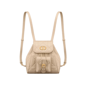 DIOR Small Caro Backpack. Authentic quality luxury bag crafted in genuine leather comes with authenticity card, dust bag and gift bag. Elegance Meets Effortless Edge. Elevate your everyday with the DIOR Small Caro Backpack — a flawless blend of modern femininity and iconic House craftsmanship. Luxuriously crafted in lambskin, its supple silhouette is enhanced by bold Macrocannage topstitching that whispers timeless Dior style. The antique gold-finish ‘CD’ clasp opens to a drawstring main compartment, perfectly balancing beauty and practicality. A discreet flap pocket keeps your daily essentials close at hand, while the top handle and adjustable leather straps offer versatile, all-day comfort. Whether slung over your shoulder or carried by hand, this petite powerhouse delivers Parisian polish in every step.