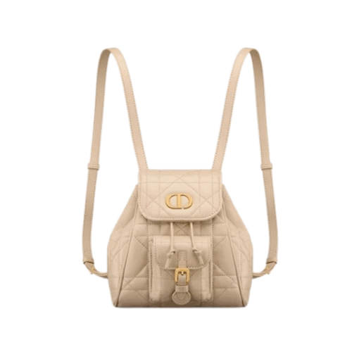 DIOR Small Caro Backpack. Authentic quality luxury bag crafted in genuine leather comes with authenticity card, dust bag and gift bag. Elegance Meets Effortless Edge. Elevate your everyday with the DIOR Small Caro Backpack — a flawless blend of modern femininity and iconic House craftsmanship. Luxuriously crafted in lambskin, its supple silhouette is enhanced by bold Macrocannage topstitching that whispers timeless Dior style. The antique gold-finish ‘CD’ clasp opens to a drawstring main compartment, perfectly balancing beauty and practicality. A discreet flap pocket keeps your daily essentials close at hand, while the top handle and adjustable leather straps offer versatile, all-day comfort. Whether slung over your shoulder or carried by hand, this petite powerhouse delivers Parisian polish in every step.