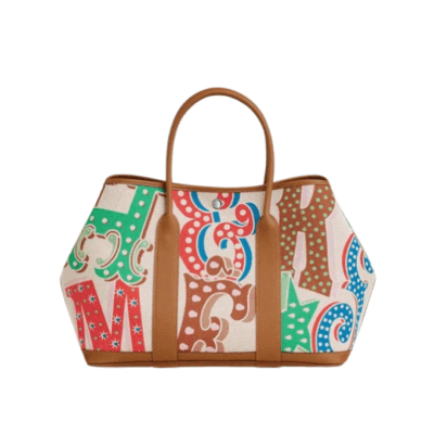 HERMÈS Garden Party Voyage. Authentic quality luxury bag crafted in genuine leather comes with authenticity card, dust bag and gift bag. The Art of Everyday Escape. Chic, structured, and effortlessly refined, the HERMÈS Garden Party Voyage is the perfect companion for your daily adventures or spontaneous weekend getaways. Crafted with precision in supple Negonda leather or canvas with leather trim, this midsize tote strikes the perfect balance between luxury and functionality. Its minimalist silhouette is elevated by discreet Clou de Selle snap closures and expandable sides, offering both form and flexibility. Spacious enough for your essentials yet compact enough to carry with ease, it’s a timeless piece designed to move with you—gracefully. Whether carried in hand or worn over the shoulder, the Garden Party Voyage 36 speaks in whispers of elegance and unmistakable HERMÈS craftsmanship. Every day is a journey. Travel beautifully.