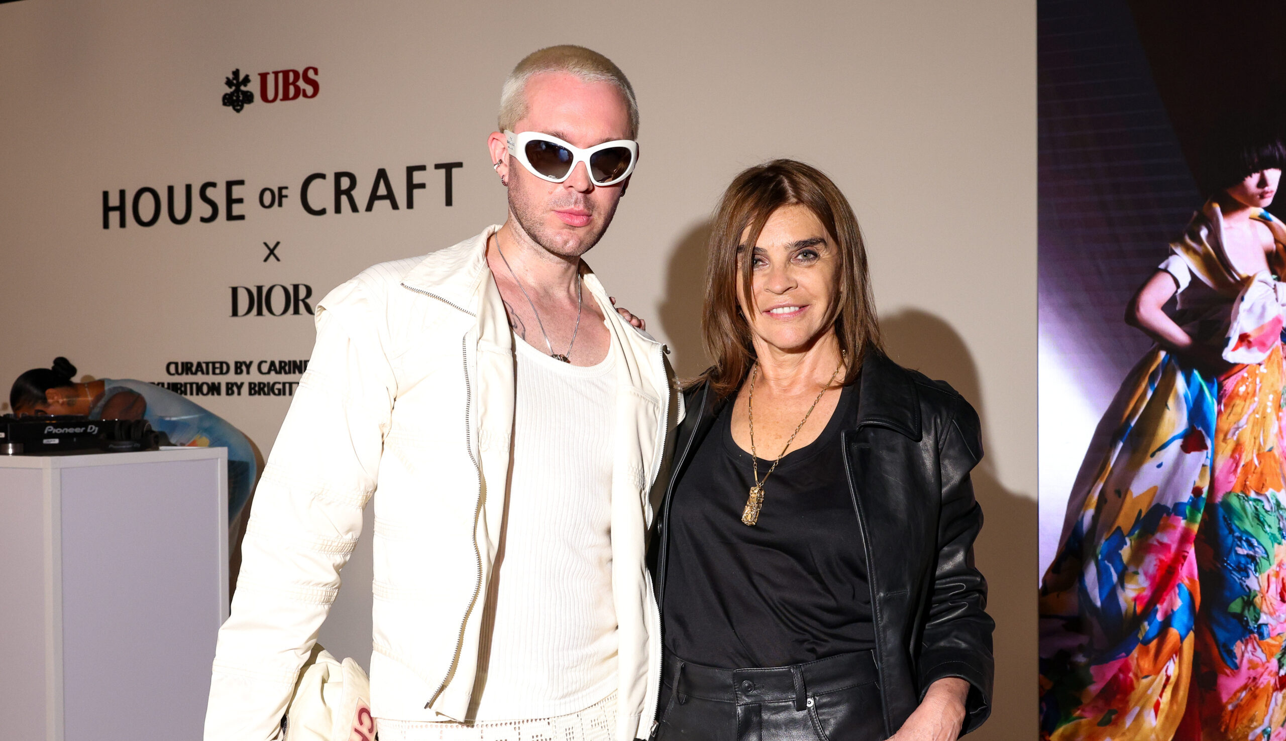 Carine Roitfeld posing at the Dior exhibition in New York sponsored by UBS Carine Roitfeld posing at the Dior exhibition in New York sponsored by UBS