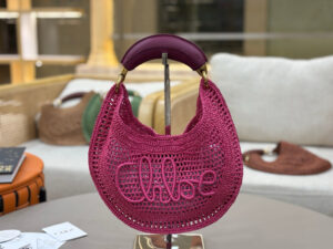 CHLOÉ Summer Banana Hobo. Authentic quality luxury bag crafted in genuine leather comes with authenticity card, dust bag and gift bag. Artisanal Spirit, Curved in Style. Say hello to sunshine in bag form. The CHLOÉ Summer Banana Hobo Bag is a joyful blend of craftsmanship and creativity, handwoven over four days by a single artisan in collaboration with Made For A Woman. This is not just a bag—it’s a story stitched in raffia and trimmed in luxurious calfskin. Its curved, banana-inspired silhouette hugs the shoulder with ease, while the sculptural handle and handwritten signature nod to Chloé’s heritage of effortless elegance. Light, natural, and undeniably chic, it's the perfect companion for sun-soaked escapes or city strolls with a coastal state of mind. A celebration of craftsmanship, femininity, and the art of slow fashion. - KRIS + KIKO CHLOÉ Summer Banana Hobo. Authentic quality luxury bag crafted in genuine leather comes with authenticity card, dust bag and gift bag. Artisanal Spirit, Curved in Style. Say hello to sunshine in bag form. The CHLOÉ Summer Banana Hobo Bag is a joyful blend of craftsmanship and creativity, handwoven over four days by a single artisan in collaboration with Made For A Woman. This is not just a bag—it’s a story stitched in raffia and trimmed in luxurious calfskin. Its curved, banana-inspired silhouette hugs the shoulder with ease, while the sculptural handle and handwritten signature nod to Chloé’s heritage of effortless elegance. Light, natural, and undeniably chic, it's the perfect companion for sun-soaked escapes or city strolls with a coastal state of mind. A celebration of craftsmanship, femininity, and the art of slow fashion.