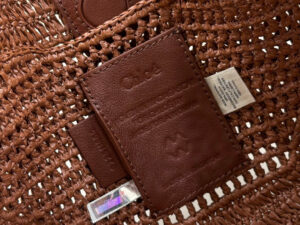 CHLOÉ Summer Banana Hobo. Authentic quality luxury bag crafted in genuine leather comes with authenticity card, dust bag and gift bag. Artisanal Spirit, Curved in Style. Say hello to sunshine in bag form. The CHLOÉ Summer Banana Hobo Bag is a joyful blend of craftsmanship and creativity, handwoven over four days by a single artisan in collaboration with Made For A Woman. This is not just a bag—it’s a story stitched in raffia and trimmed in luxurious calfskin. Its curved, banana-inspired silhouette hugs the shoulder with ease, while the sculptural handle and handwritten signature nod to Chloé’s heritage of effortless elegance. Light, natural, and undeniably chic, it's the perfect companion for sun-soaked escapes or city strolls with a coastal state of mind. A celebration of craftsmanship, femininity, and the art of slow fashion.