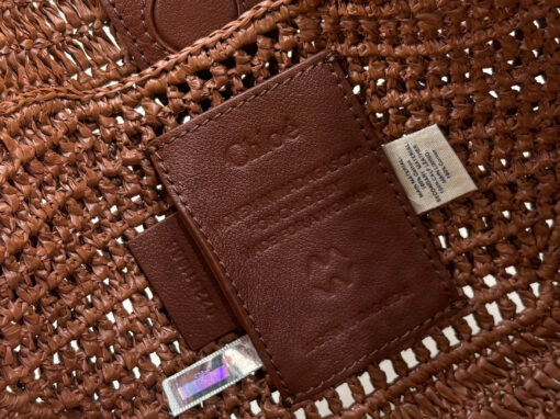 CHLOÉ Summer Banana Hobo. Authentic quality luxury bag crafted in genuine leather comes with authenticity card, dust bag and gift bag. Artisanal Spirit, Curved in Style. Say hello to sunshine in bag form. The CHLOÉ Summer Banana Hobo Bag is a joyful blend of craftsmanship and creativity, handwoven over four days by a single artisan in collaboration with Made For A Woman. This is not just a bag—it’s a story stitched in raffia and trimmed in luxurious calfskin. Its curved, banana-inspired silhouette hugs the shoulder with ease, while the sculptural handle and handwritten signature nod to Chloé’s heritage of effortless elegance. Light, natural, and undeniably chic, it's the perfect companion for sun-soaked escapes or city strolls with a coastal state of mind. A celebration of craftsmanship, femininity, and the art of slow fashion.