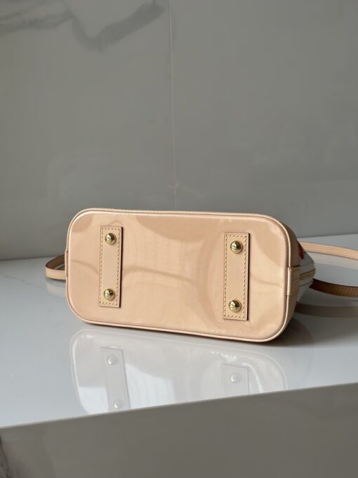 LV x TM Alma BB. Authentic quality luxury bag crafted in genuine leather comes with authenticity card, dust bag and gift bag. A Joyful Icon Reimagined. Playful, artistic, and instantly iconic—the Alma BB returns in a joyful re-edition as part of the celebrated LV x Murakami collection. This petite masterpiece blends the timeless Art Deco-inspired silhouette with Takashi Murakami’s signature whimsy, splashing the House’s Monogram canvas with bold, cherry-bright motifs. Crafted with natural leather accents and finished with polished gold-tone hardware, it features structured Toron top handles and a charming bow-shaped keybell that adds just the right amount of flirt. Compact yet attention-commanding, the Alma BB is a true collectible—full of joy, color, and unmistakable LV heritage. Carry art. Wear happiness. Make a statement.