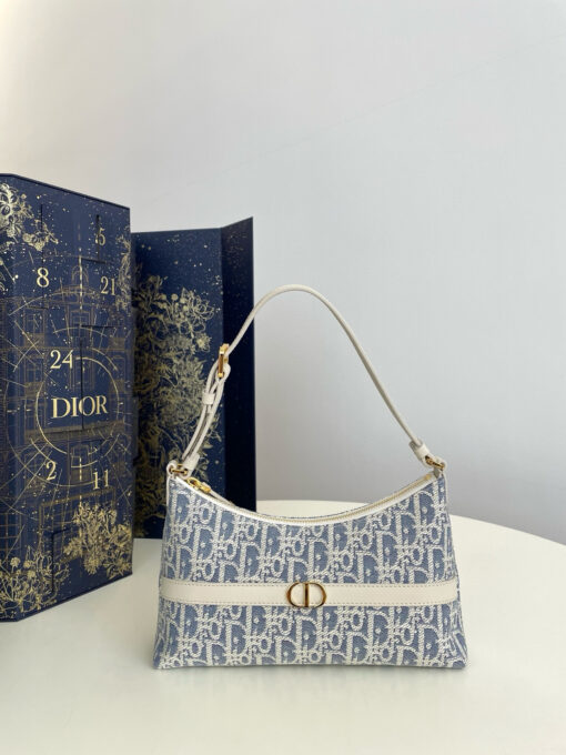 DIOR Cigale Mini Bag. Authentic quality luxury bag crafted in genuine leather comes with authenticity card, dust bag and gift bag. A Contemporary Classic in the Making. Meet the latest gem in the Miss Caro line: the Dior Cigale Mini Bag—a sleek, structured piece that blends timeless elegance with modern attitude. Crafted in supple lambskin and elevated by bold Macrocannage topstitching, this petite powerhouse exudes refined femininity from every angle. The standout tonal strap, adorned with an antique gold-finish CD signature, adds a sculptural touch to its streamlined silhouette. A secure zip compartment keeps your essentials close, while the adjustable leather strap offers effortless over-the-shoulder chic. Lightweight, luxurious, and unmistakably Dior—this is the mini bag that delivers big on style. Miss Caro’s modern muse has arrived.