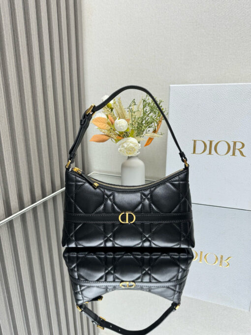 DIOR Cigale Mini Bag. Authentic quality luxury bag crafted in genuine leather comes with authenticity card, dust bag and gift bag. A Contemporary Classic in the Making. Meet the latest gem in the Miss Caro line: the Dior Cigale Mini Bag—a sleek, structured piece that blends timeless elegance with modern attitude. Crafted in supple lambskin and elevated by bold Macrocannage topstitching, this petite powerhouse exudes refined femininity from every angle. The standout tonal strap, adorned with an antique gold-finish CD signature, adds a sculptural touch to its streamlined silhouette. A secure zip compartment keeps your essentials close, while the adjustable leather strap offers effortless over-the-shoulder chic. Lightweight, luxurious, and unmistakably Dior—this is the mini bag that delivers big on style. Miss Caro’s modern muse has arrived.